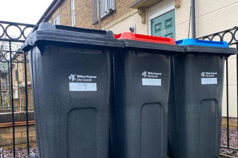 Three wheelie bins