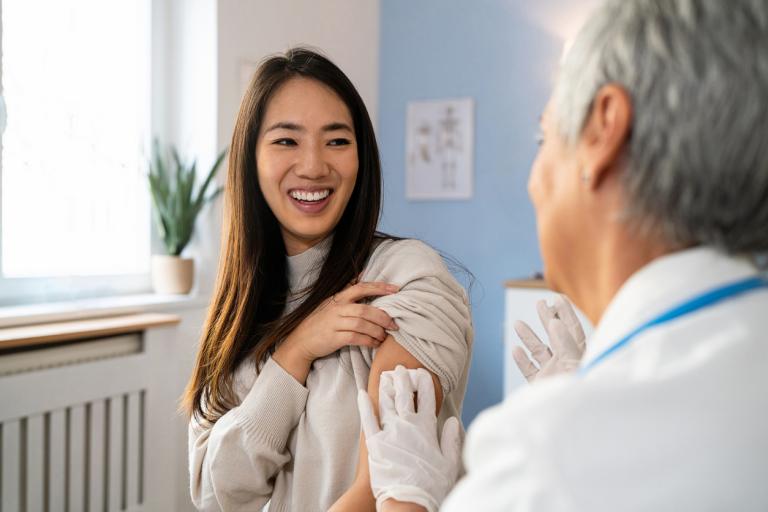 Woman receiving vaccination