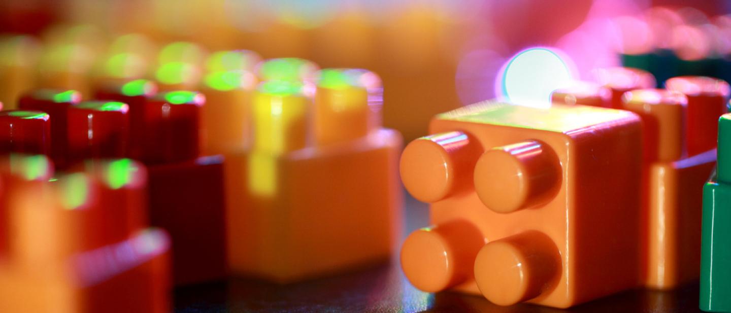 Close up of Duplo bricks in bright colours.