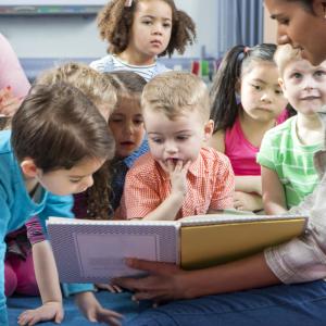 Young children enjoying songs and stories