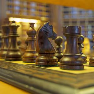 Close-up of chess pieces on a chess board